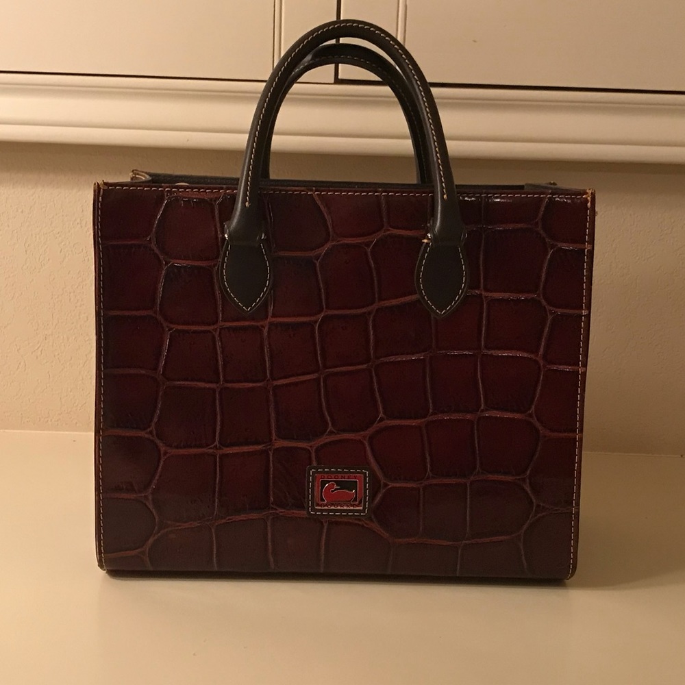 Dooney & Burke embossed purse